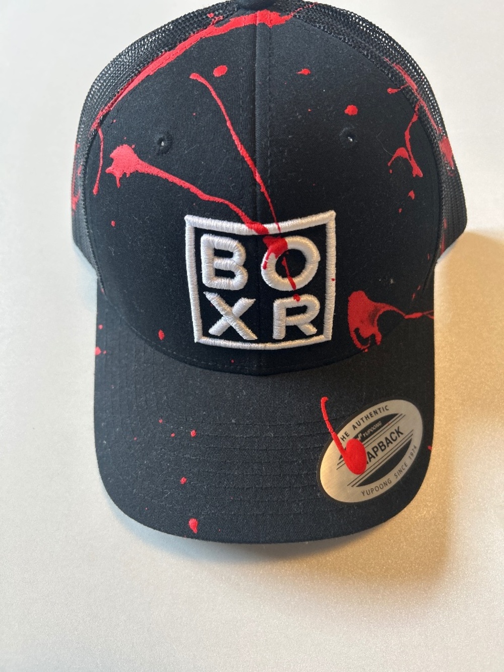 BOXR Black Red Paint Splatter Snapback Hat | YuPoong Adjustable Cap